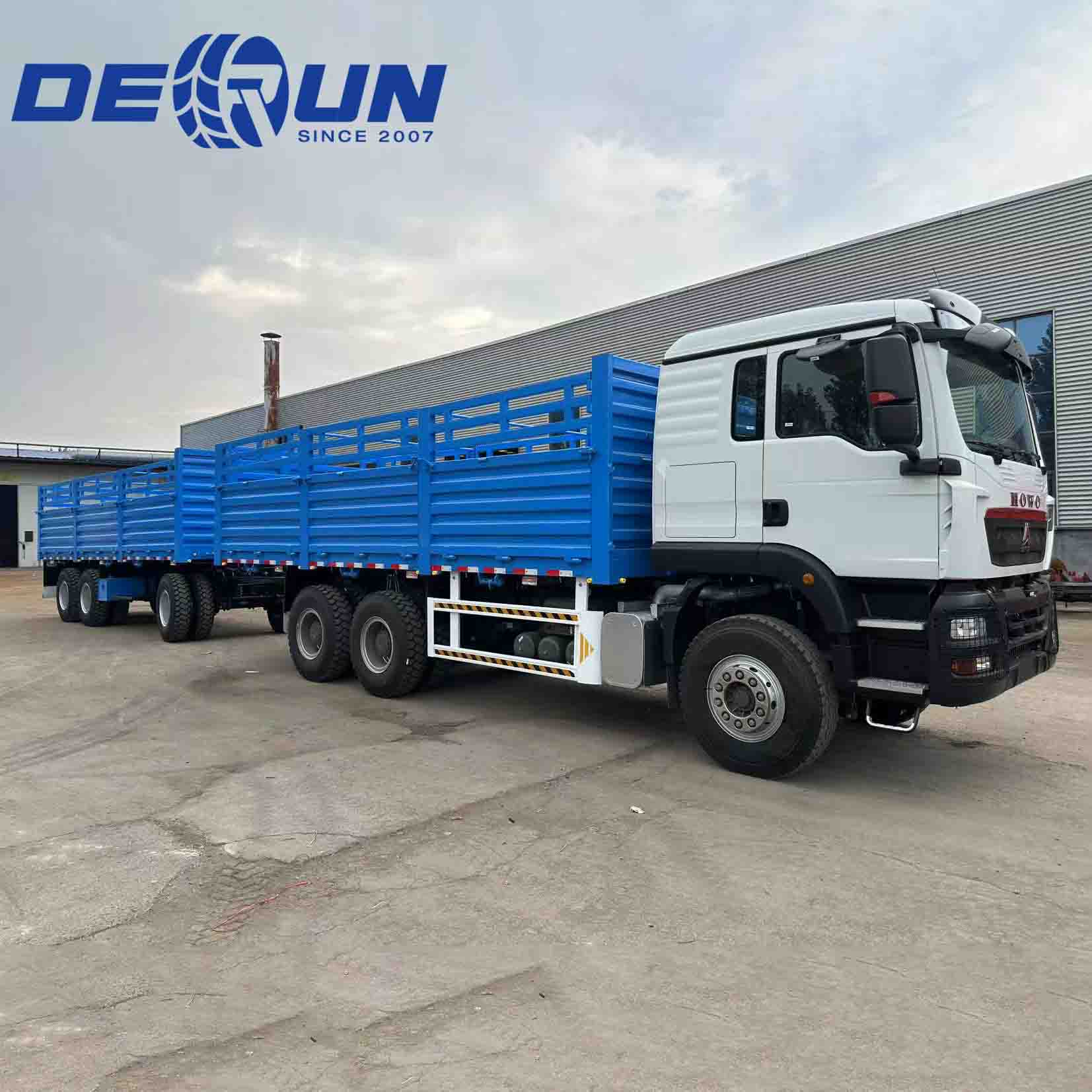 Sinotruk Howo TX 6x4 سياج الشحن مع 3 محور مقطورة